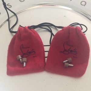 Authentic Christian Louboutin pouches with tips